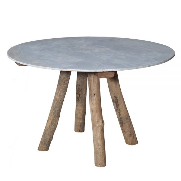 Marble Top Dining Table with 4 natural log legs that start from the middle of the table and widen towards the floor.